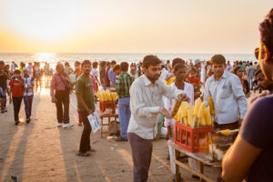 Locals at stall on the beach at sunset, Juhu, Mumbai, Maharashtra State, India Locals at stall on the beach at sunset, Juhu, Mumbai, Maharashtra State, India